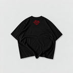 Camiseta negra boxy oversize Legendary Immortal God con lettering rojo, estrellas y año 1994 en la espalda.